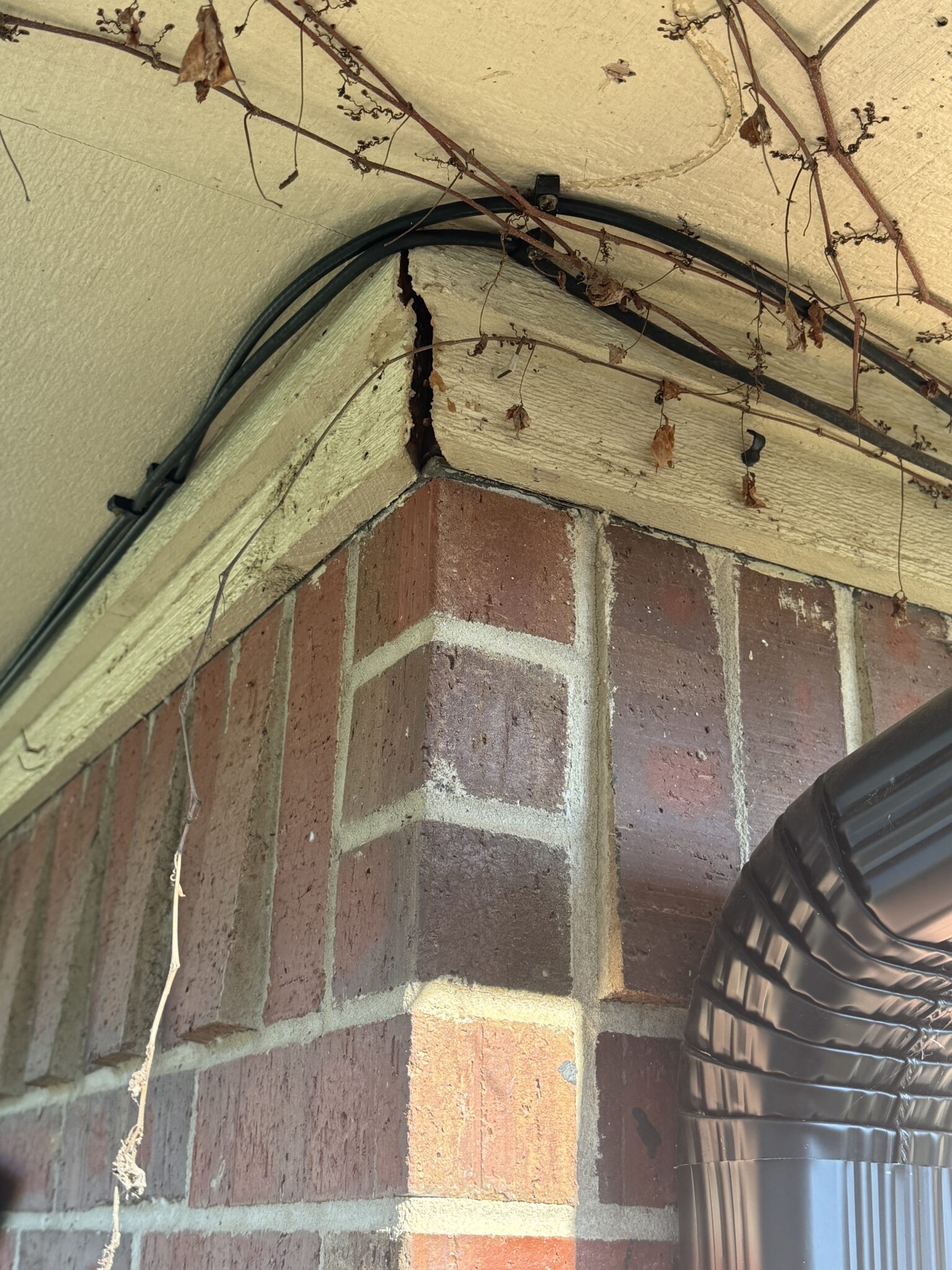 Brick wall cracks caused by foundation issues in Tyler, TX home